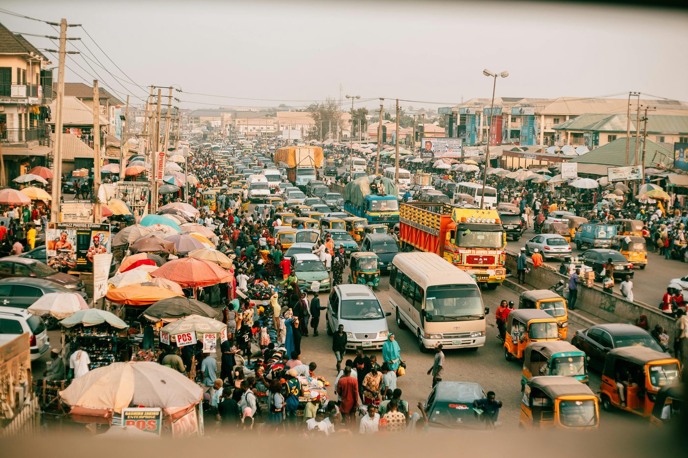 Accra rush-hour traffic: private cars stacked along a multi-lane corridor, most carrying only the driver